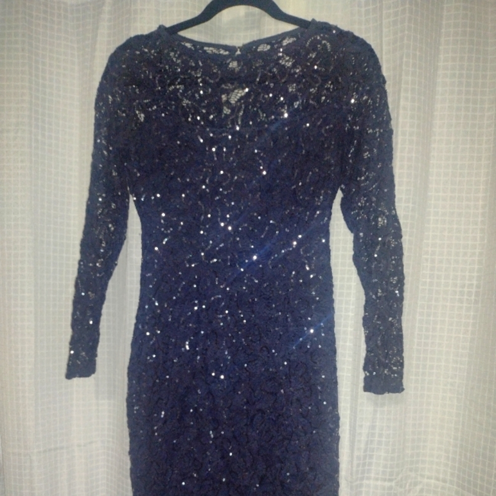 Small to medium l, lace and sequin, long sleeve dress.